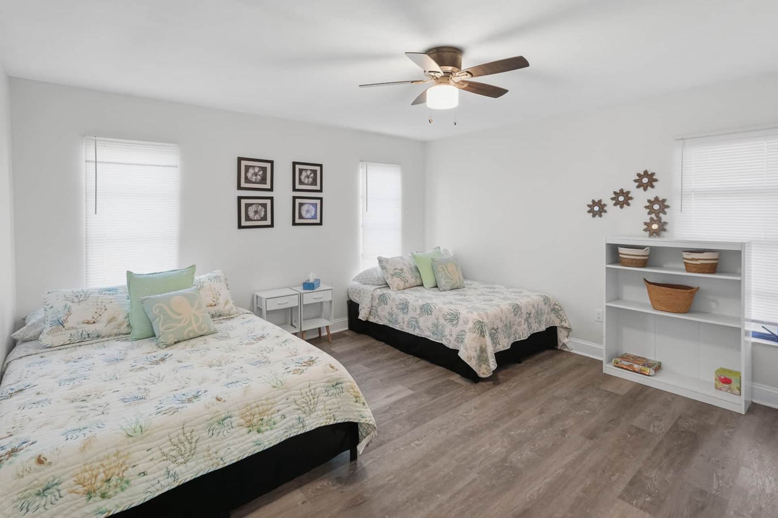 Second bedroom with two full beds